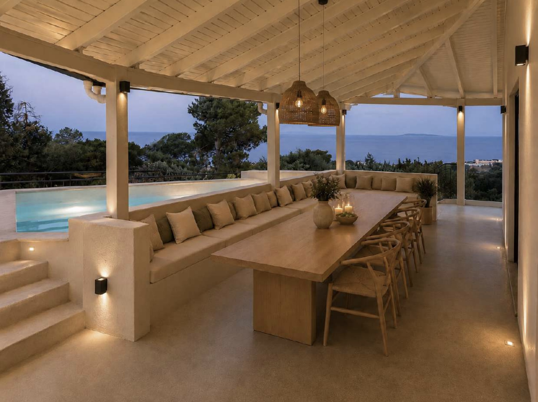 Outdoor terrace overlooking the sea at Vista Lodge Athens Riviera