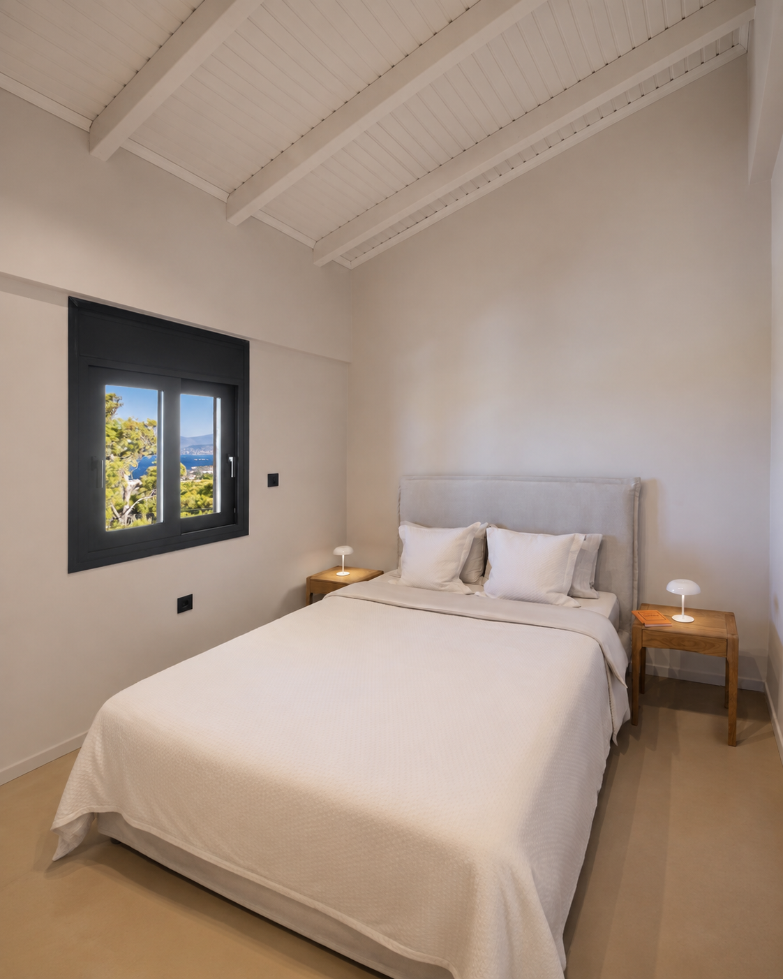 Bright double bedroom with sea view at a luxury villa in Athens Riviera