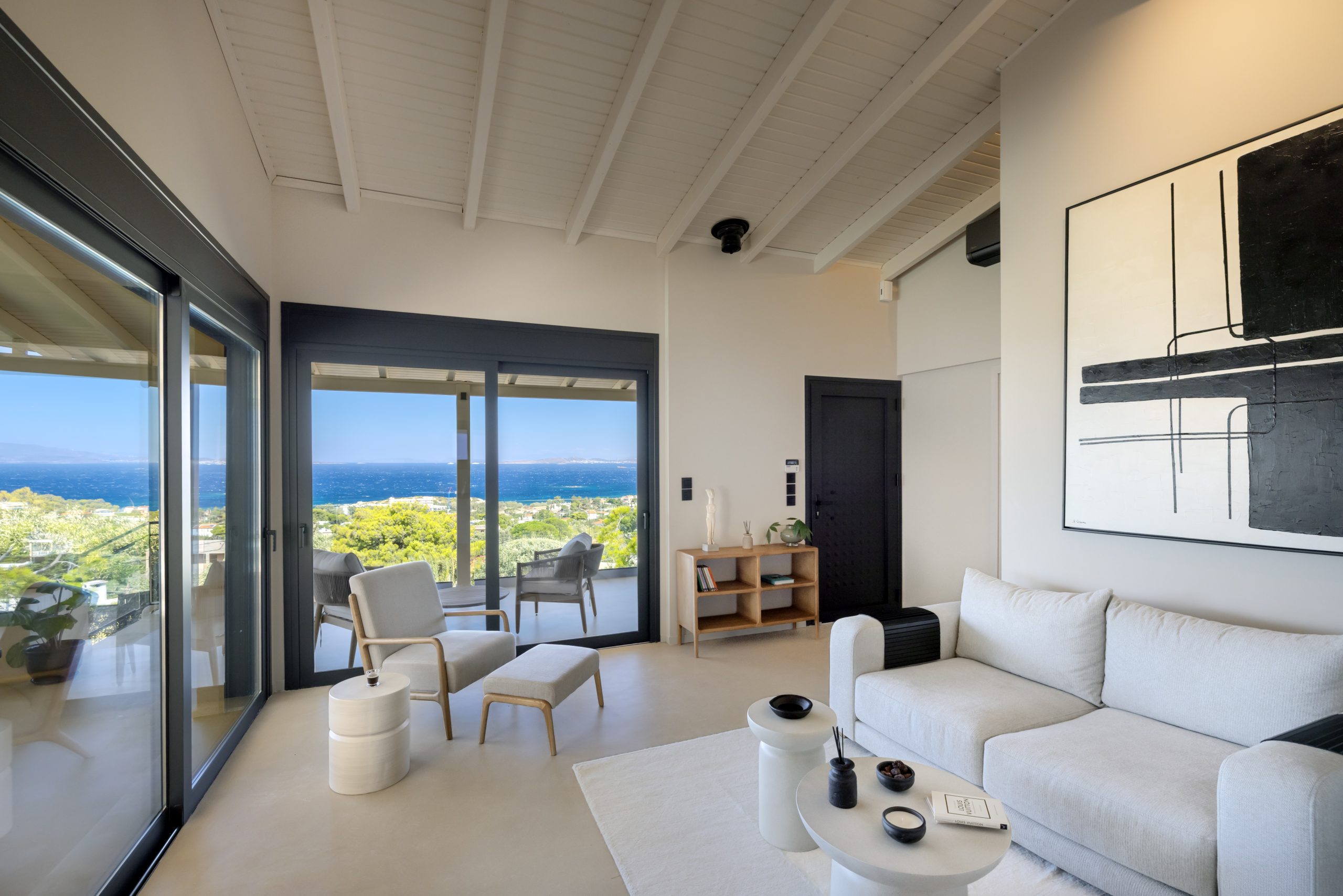 Bright living room with panoramic sea view at a luxury villa in Athens Riviera