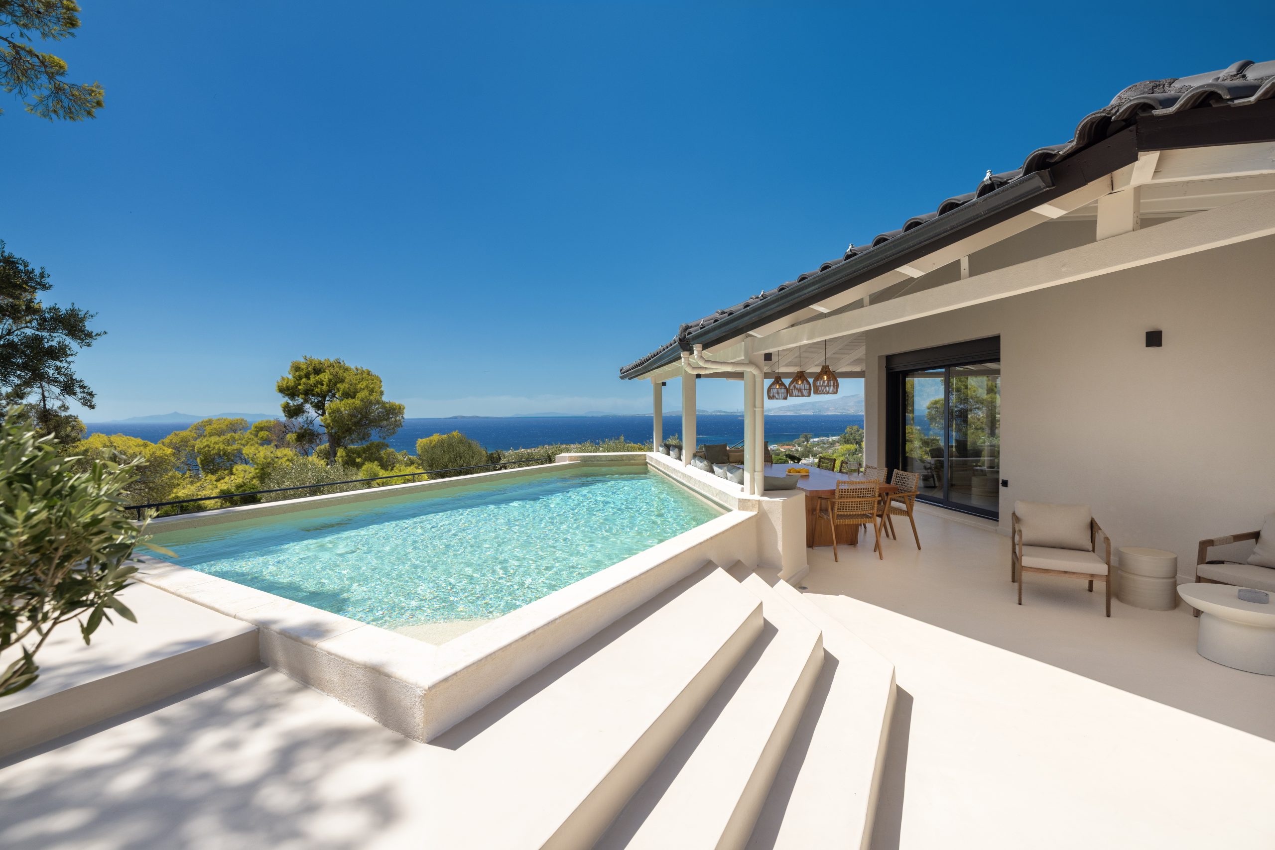 Private swimming pool and sun deck at a luxury villa in Athens Riviera