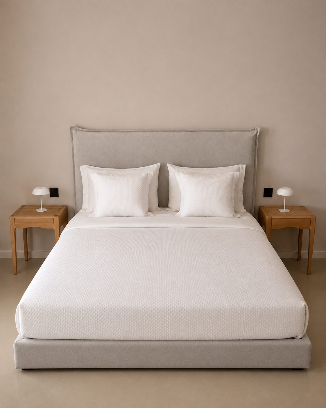 Stylish double bedroom with neutral interior at a luxury villa in Athens Riviera